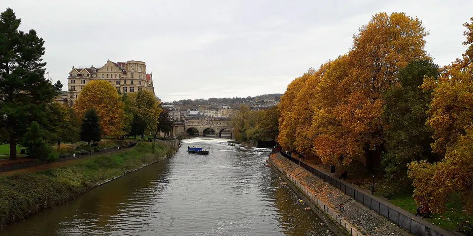 Autumn leaves and the River Avon in Bath
