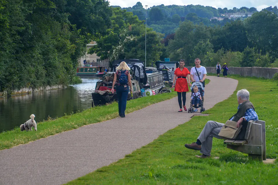 Walkers and boats on the Kennet and Avon Canal, Bath