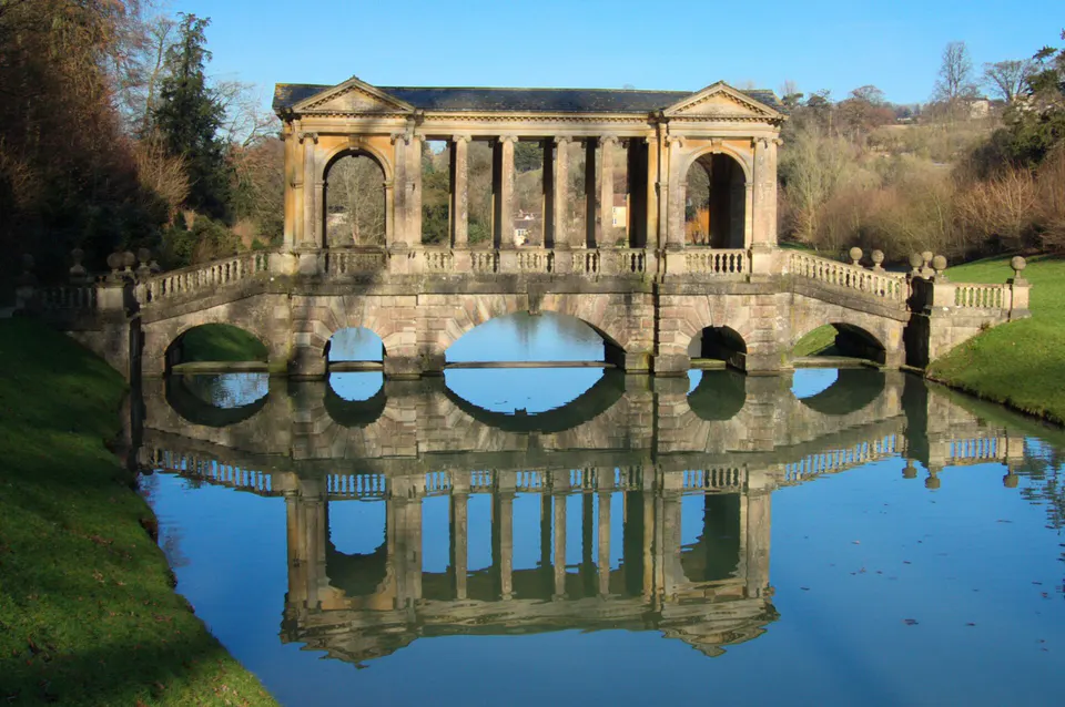 Palladian Bridge reflected in the lake at Prior Park, Bath