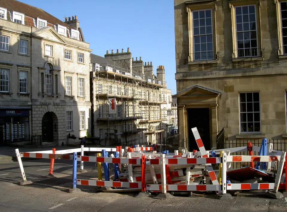 Barriers and scaffolding where a road is up in Bath