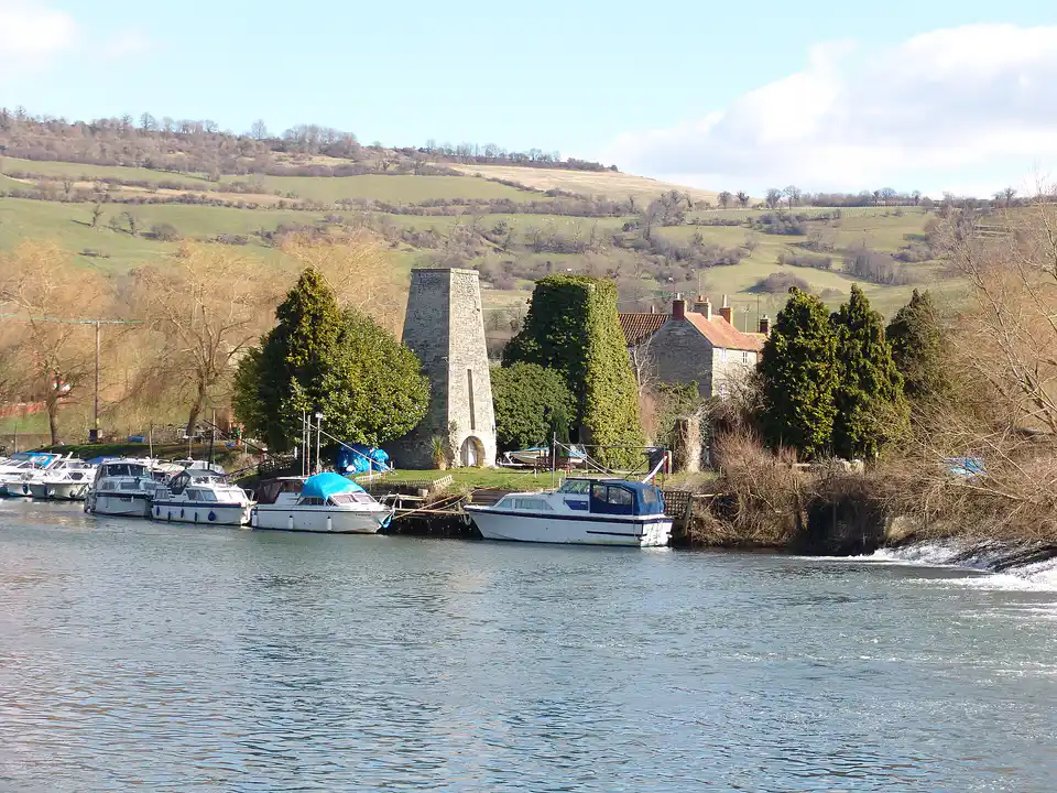 Saltford Brass Mill chimney and boats on the River Avon