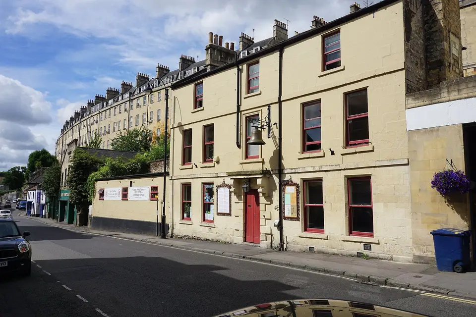 The Bell, a cream-painted pub on Walcot Street, Bath