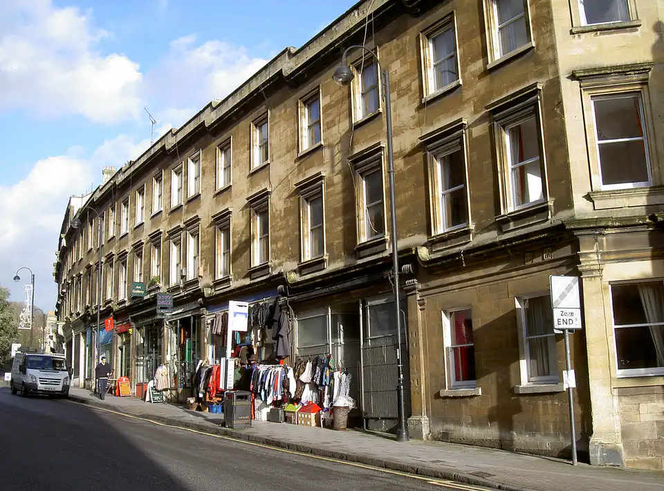 Walcot Street, Bath, with shops under a stone terrace